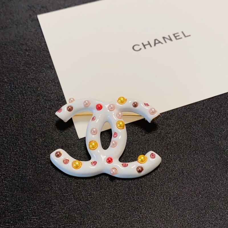 Ch**el brooches